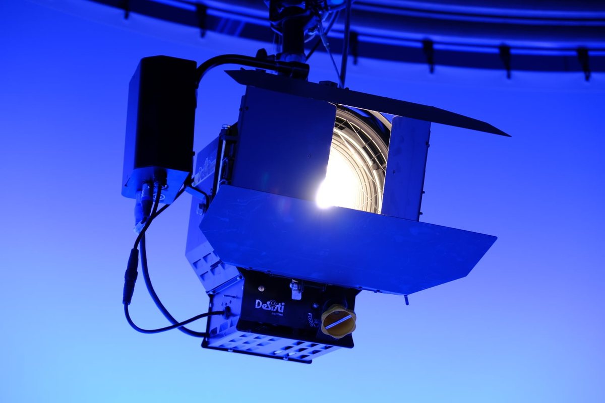 A studio spotlight throwing a bright beam